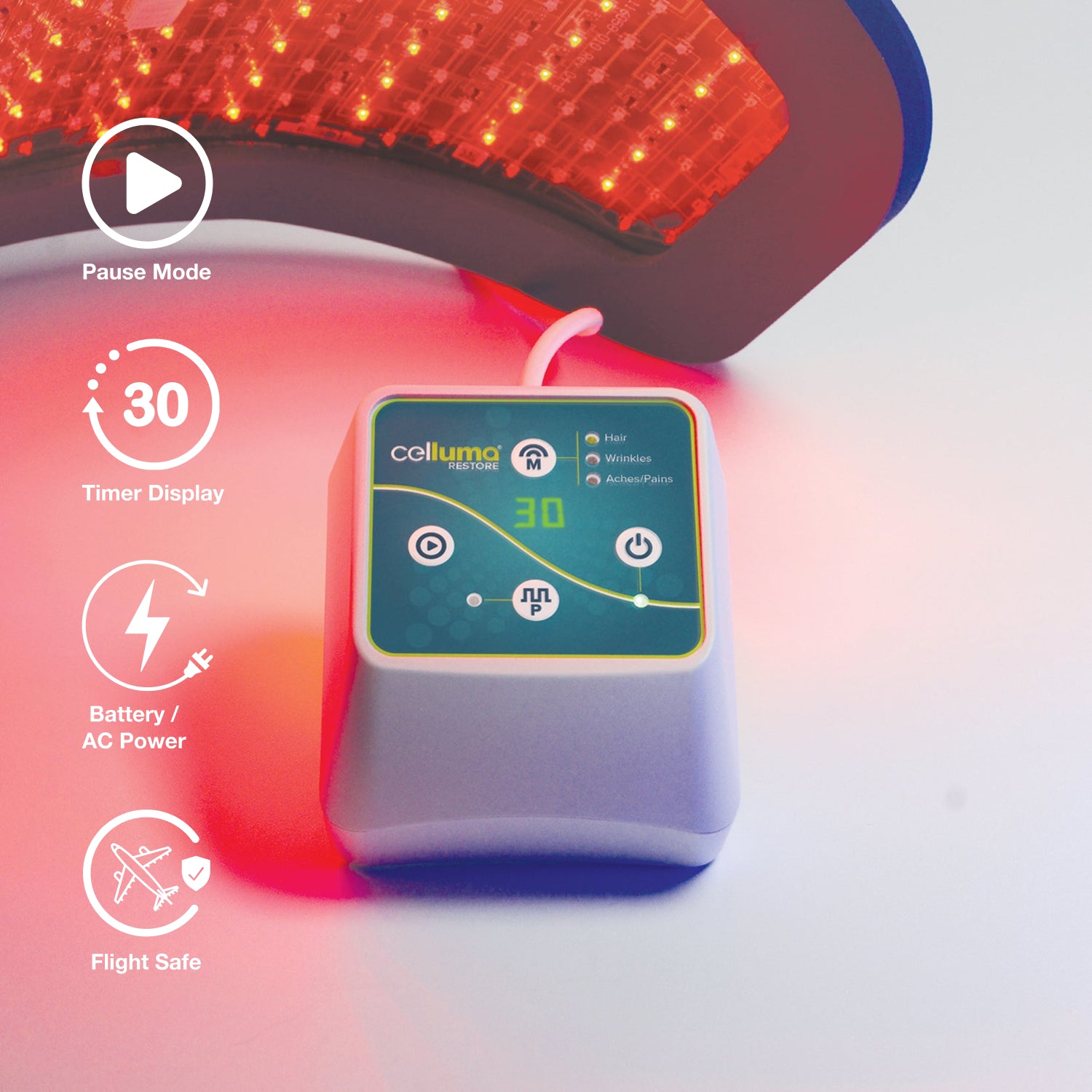 Artsy close-up of the Celluma RESTORE Series 2 G2 controller. This sleek, battery-powered interface features a digital countdown timer and 3 FDA-cleared modes for hair regrowth, fine lines, and pain relief, offering professional-grade light therapy with cordless freedom.