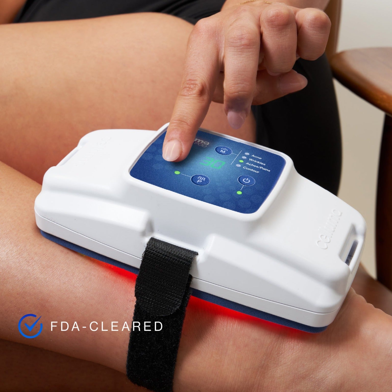 Celluma POD II handheld device featuring medical-grade LEDs. This Series 2 model delivers professional-grade 465nm blue, 640nm red, and 880nm near-infrared wavelengths for targeted, FDA-cleared treatment of acne, wrinkles, pain, and body contouring.