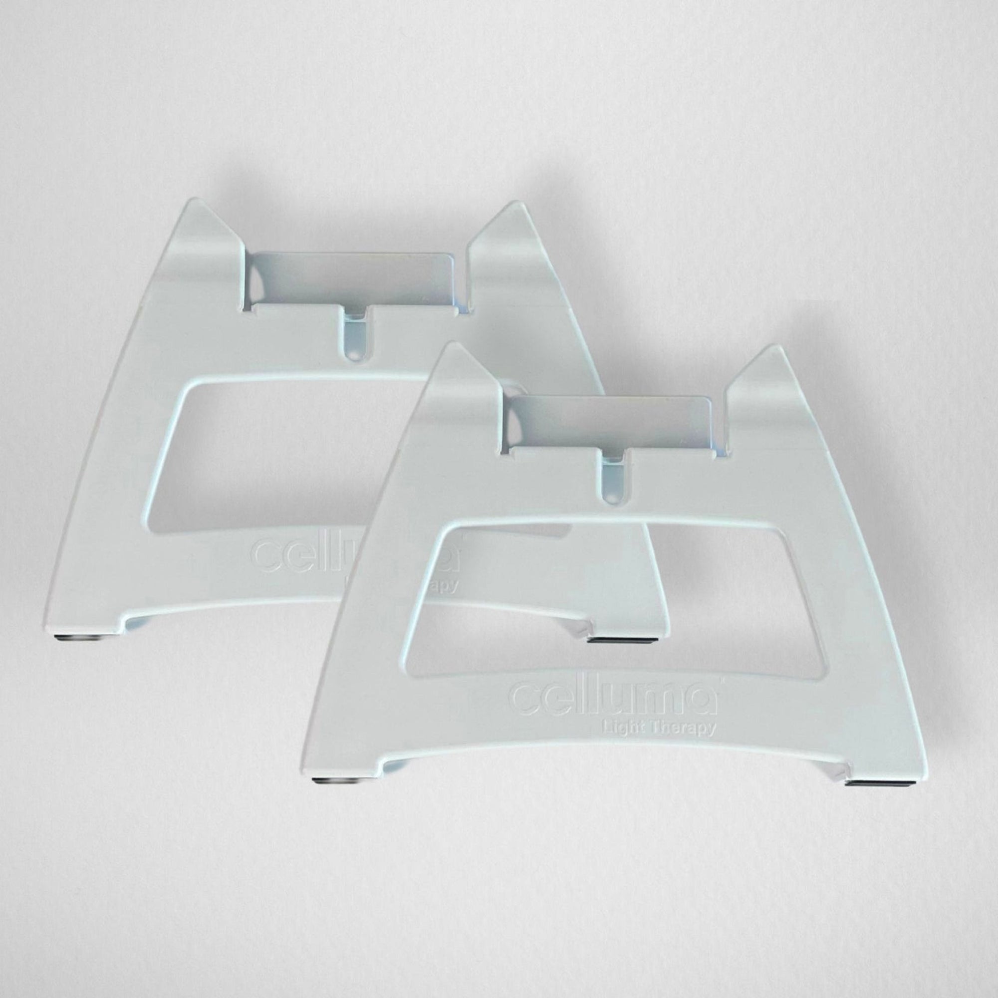 Celluma RESTORE with facial rest stands for anti-aging. These medical-grade stands position the flexible LED panel over the face and neck, ensuring the 640nm red and 880nm near-infrared light is delivered at the optimal distance for maximum wrinkle reduction and collagen production.