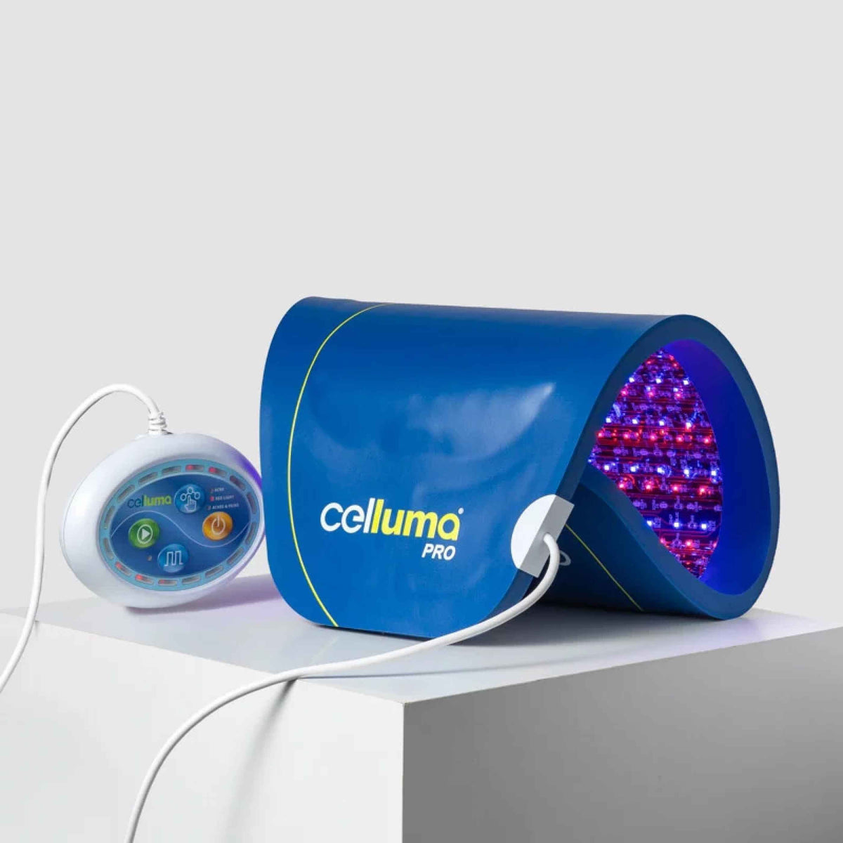Celluma panel and controller displayed on a white plinth