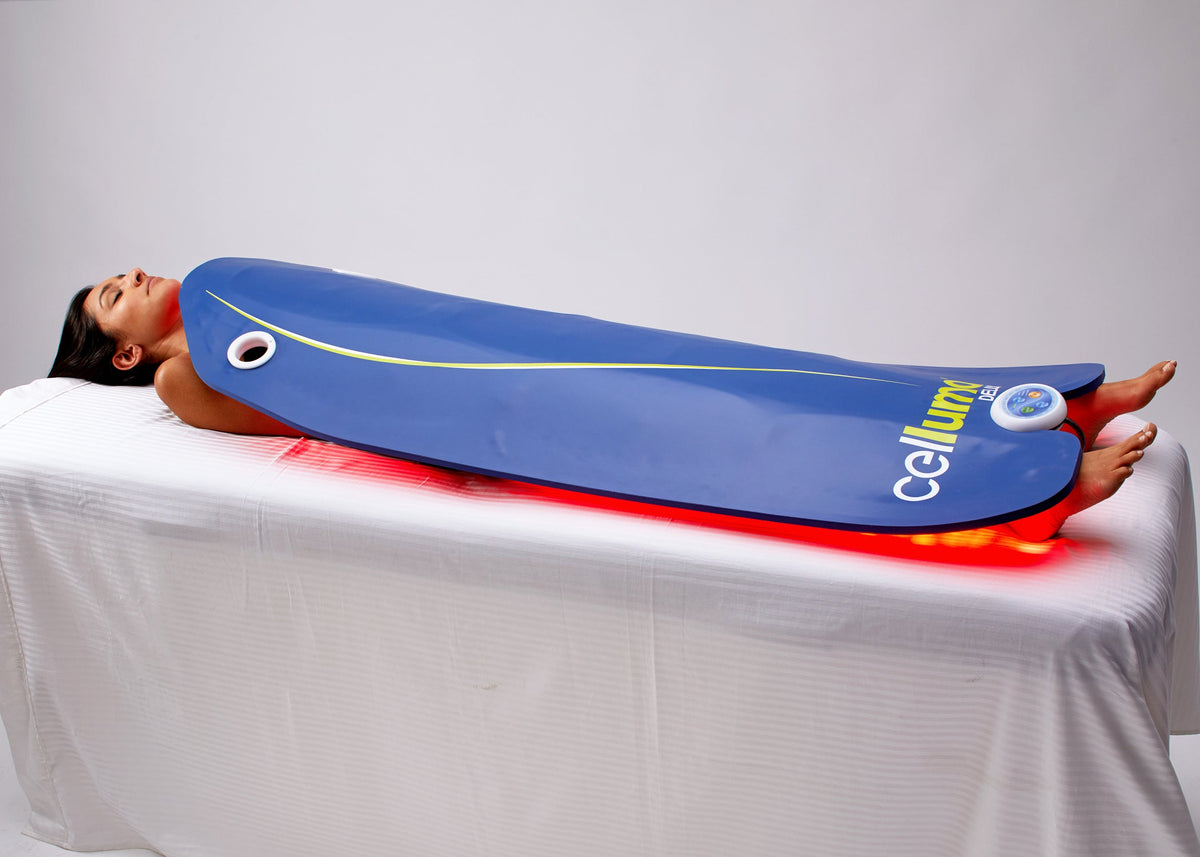 Full-length Celluma panel positioned over a reclining woman