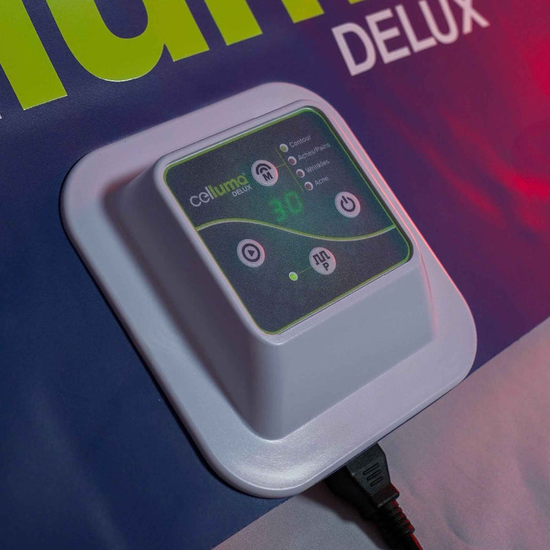 Celluma DELUX controller with mode buttons and a timer display