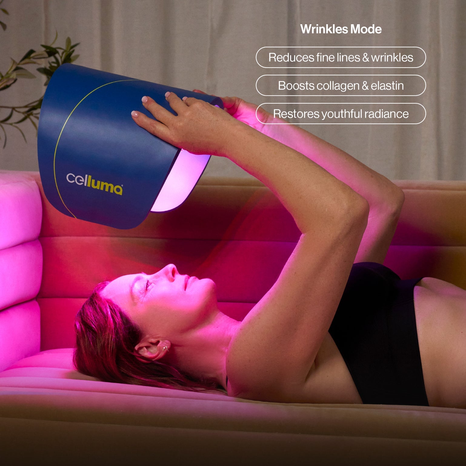 A lifestyle image of the Celluma PRO being used for anti-aging skin rejuvenation. The red light therapy setting ($640nm$) is shown in a comfortable, home setting, demonstrating how the shape-taking panel provides full-face coverage to reduce wrinkles and improve skin texture.
