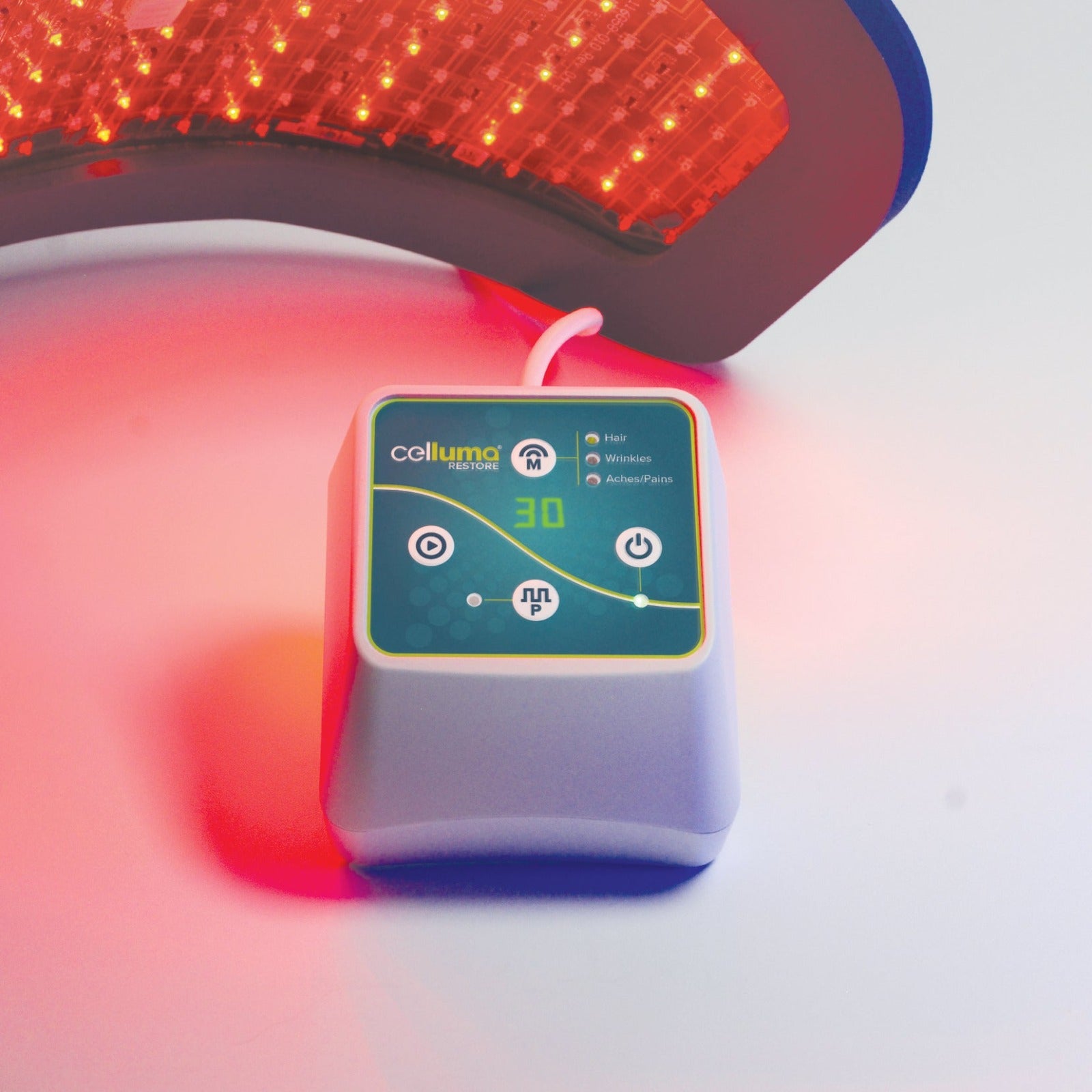 Medical-grade Celluma LED panel delivering targeted 450nm blue and red light for acne and skin rejuvenation